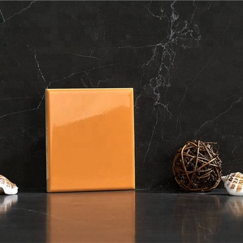 Gạch thẻ ốp tường DaiSan màu cam nhạt bóng 100x100mm M1109B