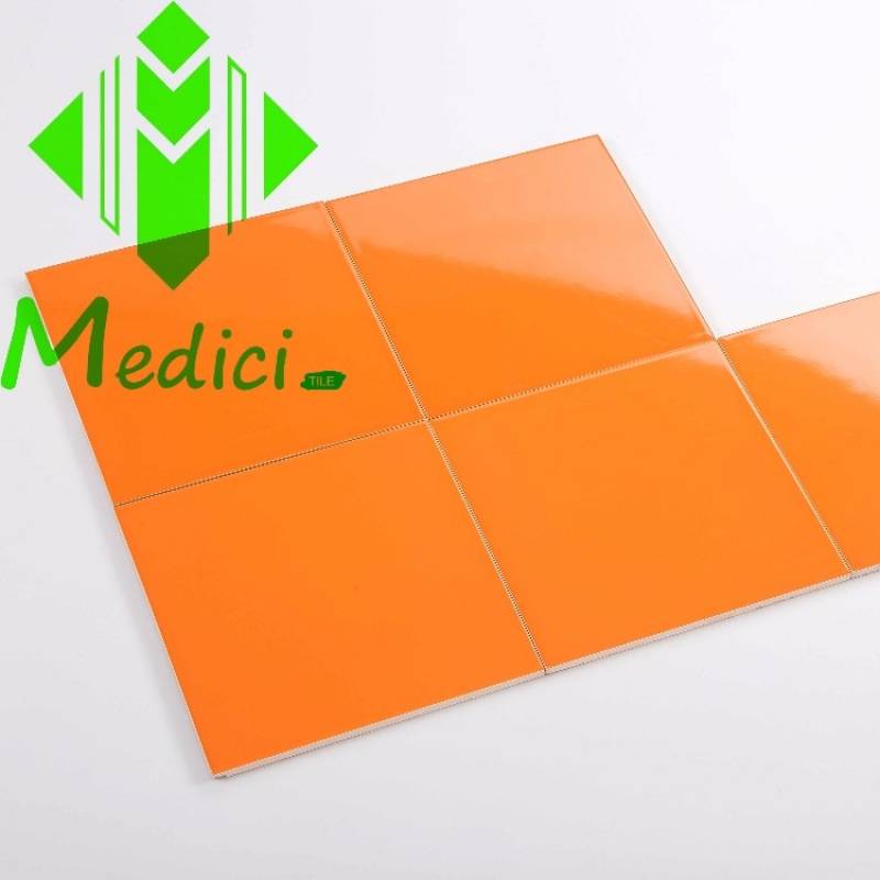 Gạch thẻ ốp tường DaiSan màu cam bóng 100x100mm M1109