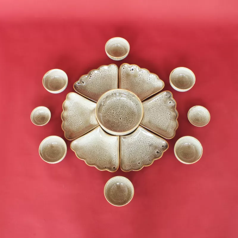 Bộ bát đĩa hoa mặt trời men nổ da báo hỏa biến thủ công tại Bát Tràng